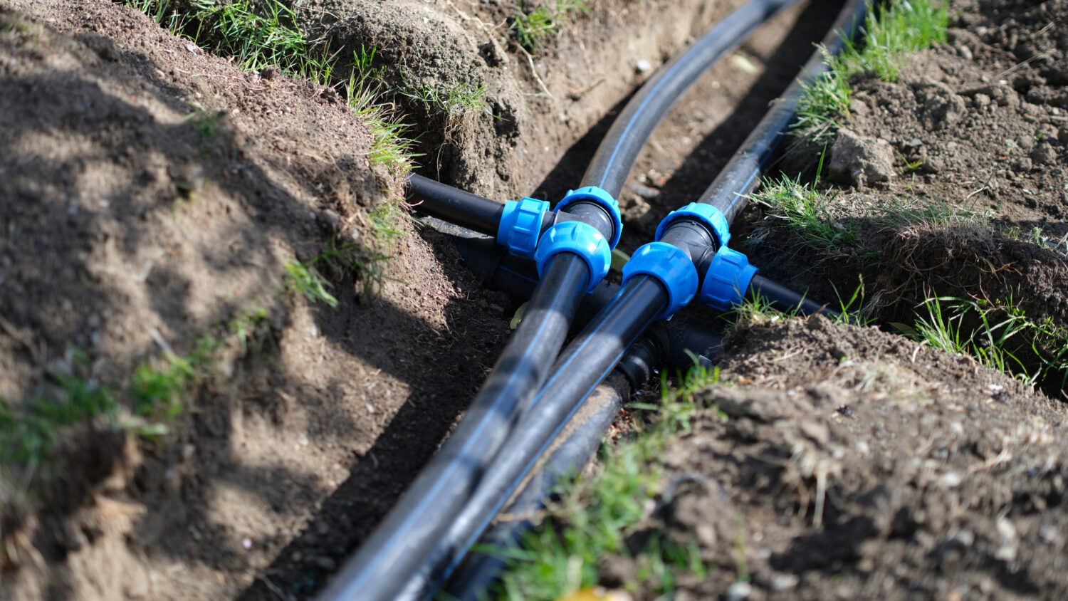 Installed PVC water pipes in trench